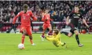  ?? Photograph: Action Press/REX/Shuttersto­ck ?? Kingsley Coman goes round Frederik Rønnow to score Bayern’s second goal.