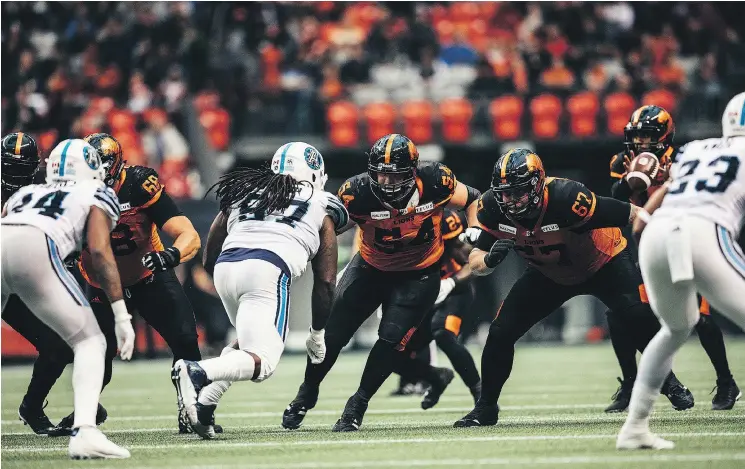  ?? — MARLON SORIANO FILES ?? B.C. Lions offensive lineman Andrew Peirson (54) is making the most of being an unexpected starter after a couple of injuries to other linemen.