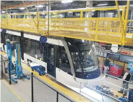  ?? THE CANADIAN PRESS ?? A Metrolinx LRV is shown being built at Bombardier’s plant in Thunder Bay, Ont. Metrolinx and Bombardier are at odds over the future of a deal to supply cars for new Toronto rail lines.