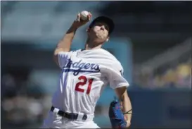  ?? JAE C. HONG - THE ASSOCIATED PRESS ?? Los Angeles Dodgers starting pitcher Walker Buehler throws against the Colorado Rockies during the first inning of a tiebreaker baseball game, Monday, Oct. 1, 2018, in Los Angeles.