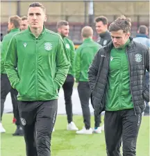  ??  ?? Paul Hanlon (left) alongside Lewis Stevenson