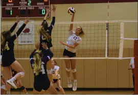  ?? AUSTIN HERTZOG – MEDIANEWS GROUP ?? Pope John Paul II’s Sarah Ward hits a kill against Villa Maria on Tuesday in the District 1-3A Championsh­ip at Harriton High School.