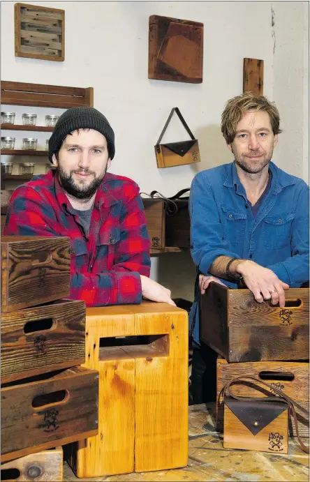  ?? JENELLE SCHNEIDER/PNG ?? Lenny, left, and Sam Clemens in Hobo Woodworks in East Vancouver.