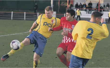  ??  ?? Sunderland RCA defender Ross Preston (yellow) clears in last month’s clash with Seaham Red Star.