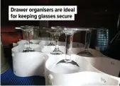  ?? ?? Drawer organisers are ideal for keeping glasses secure