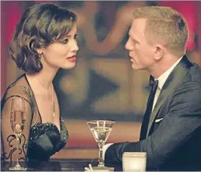  ??  ?? Berenice Marlohe and Daniel Craig bring glitz and glamour to Skyfall.