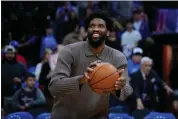  ?? MATT SLOCUM - THE ASSOCIATED PRESS ?? Joel Embiid shoots before Saturday’s game against Charlotte.