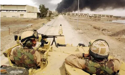  ?? Photograph: PA ?? Challenger II tank of the Desert Rats in Basra, southern Iraq, April 2003.