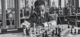  ?? Christophe­r Lee / New York Times file photo ?? Tanitoluwa Adewumi, then 8, was crowned state chess champion for kindergart­en through third grade in March 2019 at Public School 116 in Manhattan.