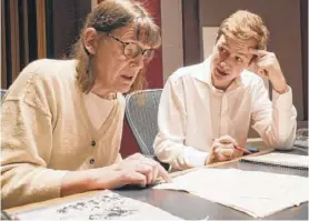  ??  ?? Professor Patricia Hall and graduate student Joshua Devries reviewing the manuscript for “The Most Beautiful Time of Life” at the Duderstadt Center recording studio in Ann Arbor.