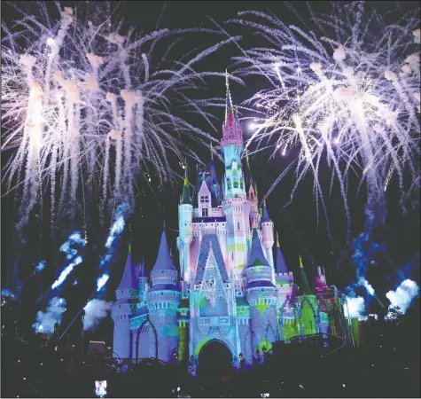  ?? — GETTY IMAGES FILES ?? No NBA teams will be staying inside Cinderella’s castle at Walt Disney World in Orlando, Fla., but the players will be near enough to be able to see the nightly fireworks display.