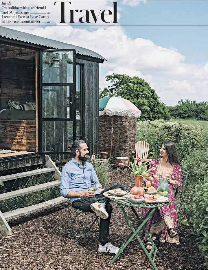  ?? ?? i Happy glamping: partners Ffion and Ollie have embraced a new way of life