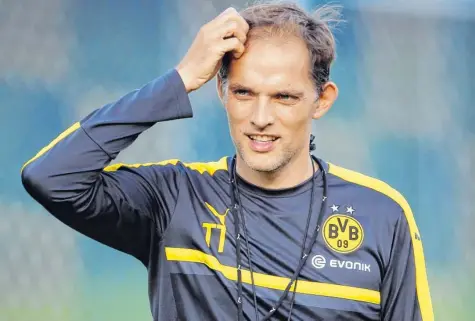  ?? Foto: Eddy Risch, dpa ?? Viele talentiert­e neue Spieler in der Mannschaft – das schafft auch Probleme, die BVB-Trainer Thomas Tuchel (Bild) lösen muss.