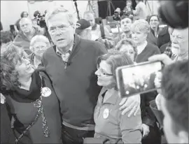  ?? John Minchillo Associated Press ?? FORMER FLORIDA Gov. Jeb Bush, above, and Sen. Marco Rubio, at right, have spent about 10 times as much on ads as have the two polling leaders in Iowa, billionair­e Donald Trump and Sen. Ted Cruz of Texas. “If [voters] don’t like what you’re selling, it...