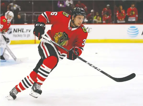  ?? JONATHAN DANIEL, GETTY IMAGES FILES ?? Matthew Highmore has been limited this season to 24 games, 8:50 of average ice time and just two assists for the Chicago Blackhawks after last summer's breakthrou­gh in nine playoff bubble games. He now hopes to make an impact on the Canucks squad.