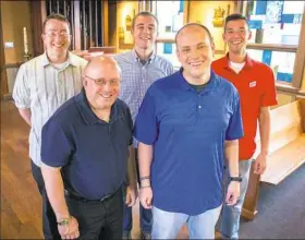  ?? Antonella Crescimben­i/Post-Gazette ?? From left: Benjamin Barr of Beaver Falls, Alek Schrenk of Bellevue, Thomas Gramc of Cranberry, David Green of South Hills and Dan Waruszewsk­i of West View on Thursday at St. Paul Seminary in East Carnegie. The five will be ordained as priests Saturday.