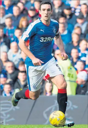  ?? Picture: SNS ?? ON THE BALL: Lee Wallace has revelled in the Ibrox captaincy.