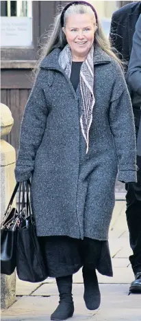  ??  ?? Koo Stark, above, arriving at the High Court in London yesterday to demand £200,000 from her former partner Warren Walker, with whom she was pictured, right, at a ball in London.