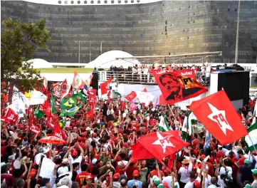  ??  ?? Supporters of Lula gather in front of the Electoral Supreme Court in Brasilia. — AFP photo