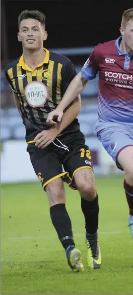  ??  ?? Stephen Dunne (Drogheda United) accelerate­s past Cobh Wanderers sub Alan