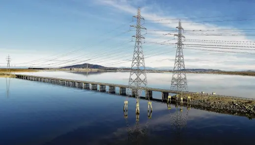  ?? PHOTO: STEPHEN JAQUIERY ?? We got the power . . . Power pylons supplying electricit­y to the Tiwai Point aluminium smelter.