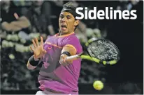  ?? GREGORIO BORGIA/THE ASSOCIATED PRESS ?? Spain’s Rafael Nadal returns the ball to the United States’ Jack Sock during their match Thursday at the Italian Open in Rome.