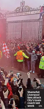  ??  ?? Shameful: Liverpool fans attack City’s team coach last week