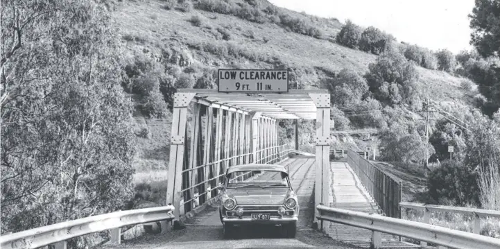  ??  ?? A Ford Cortina on Queens Park Bridge in 1966.