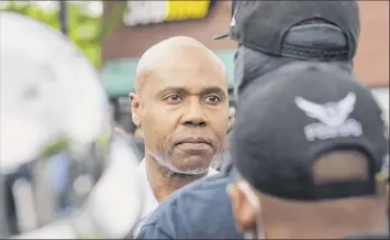  ?? Paul Buckowski / times union ?? Albany Police Chief eric Hawkins on June 1 talks to protesters gathered at the intersecti­on of Henry Johnson Boulevard and Livingston Avenue.