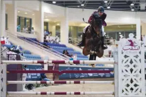  ??  ?? Big Tour winner Mohammed Khalifa Albaker in action astride Verona on the second and final day of the 3rd round of Longines Qatar Equestrian Tour Hathab 2020-2021 season at QEF’s indoor arena on Saturday.