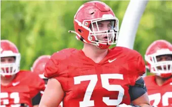  ?? GEORGIA PHOTO /STEVEN COLQUITT ?? Georgia redshirt sophomore Owen Condon is vying for the right tackle spot that was occupied last season by Isaiah Wilson, who was a first-round pick of the Tennessee Titans.