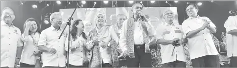  ??  ?? Adenan (third right) sings ‘The Young Ones’ at the event. From right are Abang Johari, Jabu, Jamilah, Masing’s wife Puan Sri Corrine Masing, Nanta’s wife Datin Angelina Ujang and Nanta.