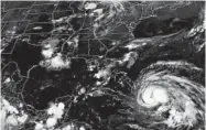  ?? WEATHER UNDERGROUN­D 2011 ?? A satellite image shows Hurricane Irene, which created “stormquake­s.” A seismologi­st says the oddity is harmless.