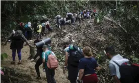  ?? Photograph: Iván Valencia/AP ?? The journey across the Darien Gap is long and difficult, as seen here on 9 May 2023.