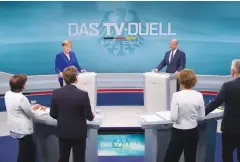  ?? (Reuters) ?? GERMAN CHANCELLOR Angela Merkel and her challenger, SPD candidate for chancellor Martin Schulz, hold a debate in Berlin earlier this month.