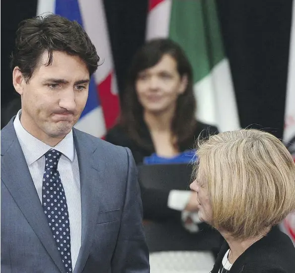  ?? SEAN KILPATRICK /THE CANADIAN PRESS ?? Prime Minister Justin Trudeau met with Premier Rachel Notley during the First Ministers meeting in Ottawa earlier this week. Critics are blaming both of them for the cancellati­on of the Energy East pipeline.