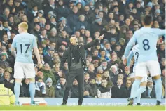 ??  ?? Manchester City’s Spanish manager Pep Guardiola (C) gestures during the English Premier League football match between Manchester City and Tottenham Hotspur at the Etihad Stadium in Manchester, north west England, on December 16, 2017. - AFP photo
