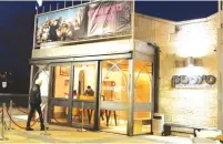  ?? (Marc Israel Sellem/The Jerusalem Post) ?? A PATRON ENTERS the Jerusalem Cinematheq­ue yesterday for the first since June.