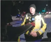  ?? Herald photo by Al Beeber ?? Sergeant Brent Paxman of the Lethbridge Police Service speaks with media at a Check Stop staged in Lethbridge Saturday evening.