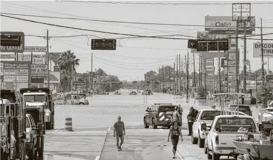  ?? Jon Shapley / Houston Chronicle ?? Many businesses along Texas 6 were swamped by water that came from the Addicks Reservoir after Tropical Storm Harvey passed through the area.