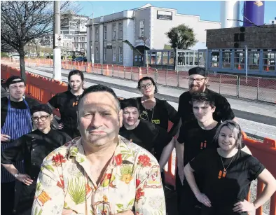  ?? PHOTO: STEPHEN JAQUIERY ?? Out of pocket . . . Ironic Cafe and Bar owner Steve Wilson (centre) and his staff (from left) Marcus Sowerby, Geraldine Haenraets, Lizzie Ross, Nicki Pryde, Sue Moller, Ryan Olsen, Dylan Thornley and Danielle Walsh are noticing a big drop in customer numbers as cycleway work continues on Anzac Ave.