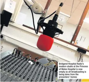  ??  ?? Bridgend Hospital Radio’s modern studio at the Princess of Wales Hospital is now empty as all broadcasti­ng is being done from the presenters’ homes