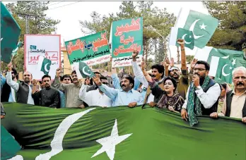  ?? BANARAS KHAN/GETTY-AFP ?? Pakistani Christians shout slogans in support of Kashmiris at a rally Sunday in connection with Wednesday’s Independen­ce Day in Quetta, Pakistan. The Indian government stripped Jammu and Kashmir of its autonomy, sparking protests.