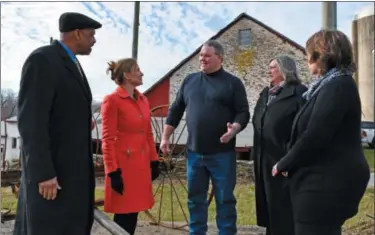  ?? SUBMITTED PHOTO ?? The Chester County commission­ers recently visited the county’s 500th preserved farm. From left to right are: Commission­er Terence Farrell; Commission­er Michelle Kichline; farm owner Gerald Rohrer; Commission­er Kathi Cozzone; and Cindy Rohrer.