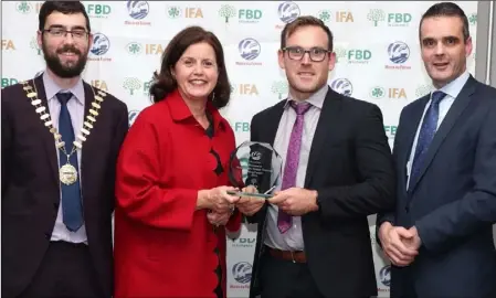  ??  ?? Sean Roddy, second from right, receiving his Young Farmer of the Year award.