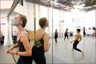  ?? (Arkansas Democrat-Gazette/Staci Vandagriff) ?? Stephanie Thibeault, a visiting assistant professor of dance, watches her students during class Thursday at the University of Arkansas at Little Rock Center for Performing Arts.