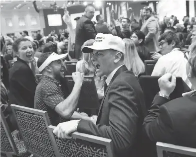  ?? ALEX BRANDON / THE ASSOCIATED PRESS ?? Angry supporters shout down a protester as President Donald Trump speaks at the Conservati­ve Political Action Conference (CPAC) on Friday in Maryland.