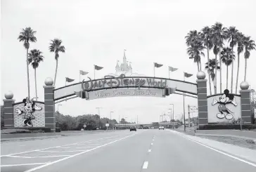  ?? JOHN RAOUX AP ?? Walt Disney World remains closed as two more unions reached agreements Friday over furloughs caused by the closure during the coronaviru­s outbreak. The agreements apply to security guards and workers involved in facilities and operations.