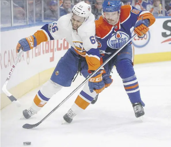  ?? JASON FRANSON/THE CANADIAN PRESS ?? Adam Larsson and the Oilers will try to up their game after a listless performanc­e against the Islanders.