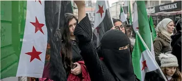  ?? PHOTO: GETTY IMAGES ?? Protesters have been vocal in their support for the people of Eastern Ghouta.